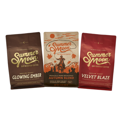 Three bags of Summer Moon Coffee: Medium Roast Glowing Ember, Medium Roast Autumn Blend, Medium Roast Velvet Blaze. 